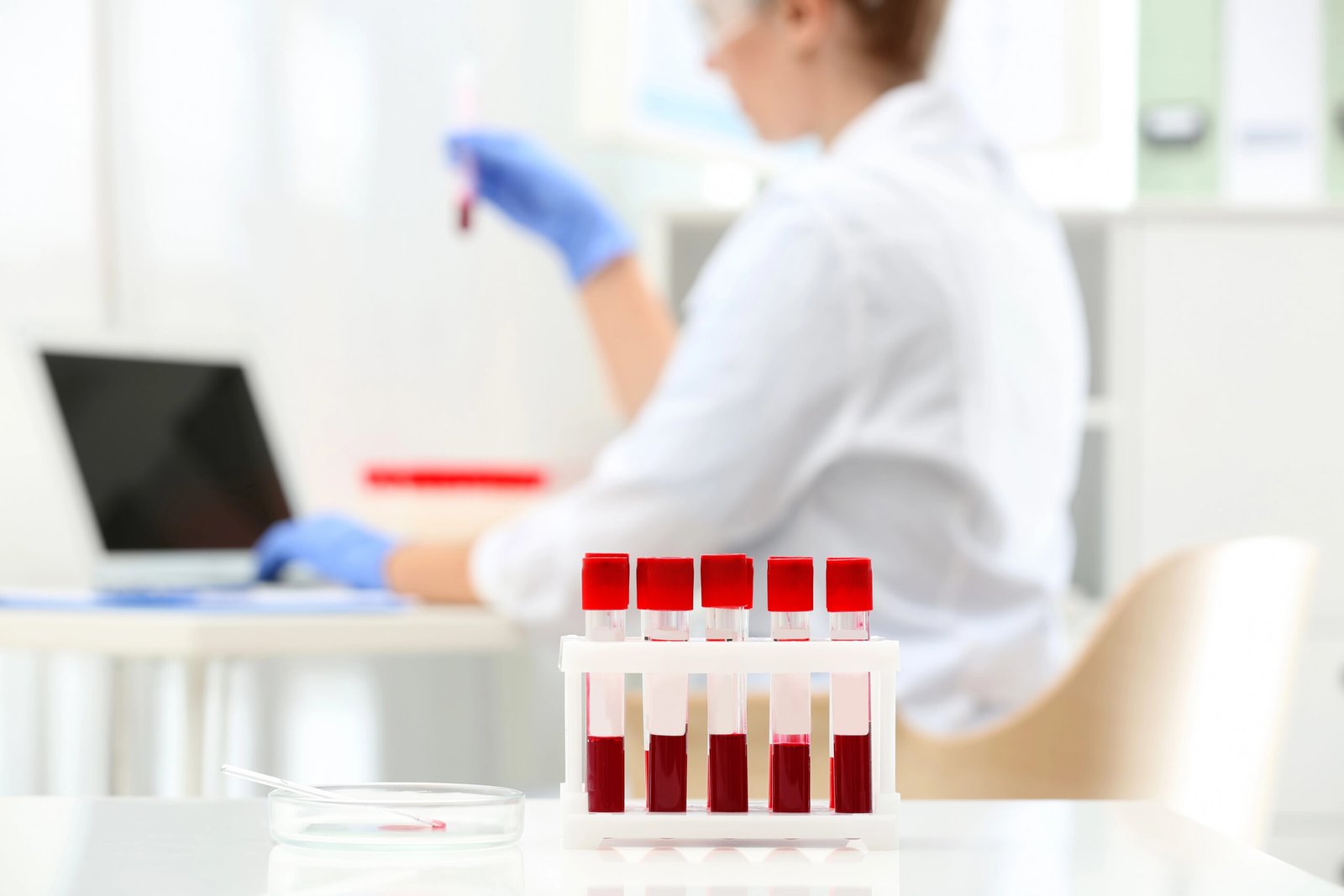 Lab bloodwork vials representing the labs-first methodology used before any treatment protocol